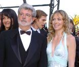 George Lucas et la fille de Dick Rivers lors de la montée des marches de La Revanche des Sith à Cannes le 14 mai 2005