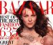 Août 2002 : Elizabeth Hurley pose avec un bébé dans les bras en Une du Harper's Bazaar.