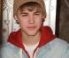 Justin Bieber illumine les décorations de Noël à l'Empire State Building à New York, le vendredi 18 novembre 2011.