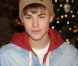 Justin Bieber illumine les décorations de Noël à l'Empire State Building à New York, le vendredi 18 novembre 2011.