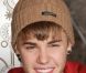 Justin Bieber illumine les décorations de Noël à l'Empire State Building à New York, le vendredi 18 novembre 2011.