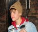 Justin Bieber donne le coup d'envoi des illuminations de Noël à l'Empire State Building à New York, le vendredi 18 novembre 2011.