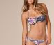 Nina Agdal présente la nouvelle collection de maillots de bain de la marque Nelly, été 2012.