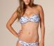 Nina Agdal présente la nouvelle collection de maillots de bain de la marque Nelly, été 2012.
