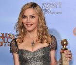 Madonna : Un Golden Globe, un Elton John froissé et un sacré buzz pour M.D.N.A.