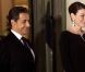 Carla Bruni-Sarkozy et Nicolas Sarkozy posent devant le seuil du palais présidentiel de l'Elysée avec Alassane  Ouattara, président ivoirien, et son épouse Dominique Ouattara, le 26 janvier 2012, à l'occasion d'un dîner d'Etat 