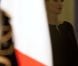Carla Bruni-Sarkozy et Nicolas Sarkozy posent devant le seuil du palais présidentiel de l'Elysée avec Alassane  Ouattara, président ivoirien, et son épouse Dominique Ouattara, le 26 janvier 2012, à l'occasion d'un dîner d'Etat 