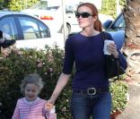 Marcia Cross, son mari Tom Mahoneh et leurs jumelles Eden et Savannah, le 28 janvier 2012 à Los Angeles