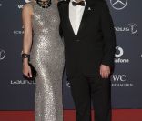  Norbert Haug et Anne Wis. 
 La cérémonie des Laureus World Sports Awards 2012, qui s'est déroulée le 6 février à Londres avec Clive Owen en maître de cérémonie, a notamment consacré Novak Djokovic Sportif de l'année, devant un parterre de légendes et de couples stars du sport. 