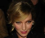 Uma Thurman, radieuse lors du défilé Tommy Hilfiger à New York, le 12 février 2012.