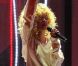 Rihanna en pleine performance de son tube We Found Love sur la scène de l'O2 Arena lors des Brit Awards 2012.