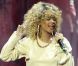 Un pull, un mini-short en jean à peine visible et des Timberland : voici le costume de scène de Rihanna, qui livrait une performance épique sur la scène des Brit Awards 2012.