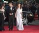 Kate Middleton avec le prince William à la soirée des Baftas organisée à Hollywood en leur honneur, en juillet 2011. La duchesse de Cambridge porte une robe Alexander McQueen.