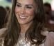 Kate Middleton avec le prince William au 10e gala annuel de l'ARK, en juin 2011. La duchesse de Cambridge porte une robe Jenny Packham.