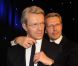 Lambert Wilson, très enthousiaste, chouchoute son double de cire