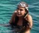 Bianca Brandolini d'Adda pique un tête et profite de l'eau turquoise de Taormina. Le 9 juillet 2012.