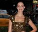 Jessica Paré, sexy statuette dorée lors du MET Gala à New York, le 7 mai 2012.