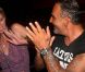 Christian Audigier et sa compagne Nathalie au VIP Room de Jean-Roch, le 27 juillet 2012. Les soeurs Hilton font la fête avec eux !