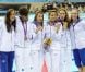Camille Muffat, Charlotte Bonnet, Ophelie-Cyrielle Etienne et Coralie Balmy heureuses après avoir décroché le bronze olympique lors du relais 4x200 m nage libre lors des Jeux olympiques de Londres le 1er août 2012