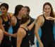 Camille Muffat, Charlotte Bonnet, Ophelie-Cyrielle Etienne et Coralie Balmy heureuses après avoir décroché le bronze olympique lors du relais 4x200 m nage libre lors des Jeux olympiques de Londres le 1er août 2012