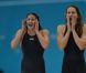 Camille Muffat, Charlotte Bonnet, Ophelie-Cyrielle Etienne et Coralie Balmy heureuses après avoir décroché le bronze olympique lors du relais 4x200 m nage libre lors des Jeux olympiques de Londres le 1er août 2012