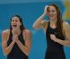 Camille Muffat, Charlotte Bonnet, Ophelie-Cyrielle Etienne et Coralie Balmy heureuses après avoir décroché le bronze olympique lors du relais 4x200 m nage libre lors des Jeux olympiques de Londres le 1er août 2012