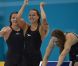 Camille Muffat, Charlotte Bonnet, Ophelie-Cyrielle Etienne et Coralie Balmy heureuses après avoir décroché le bronze olympique lors du relais 4x200 m nage libre lors des Jeux olympiques de Londres le 1er août 2012
