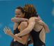 Camille Muffat, Charlotte Bonnet, Ophelie-Cyrielle Etienne et Coralie Balmy heureuses après avoir décroché le bronze olympique lors du relais 4x200 m nage libre lors des Jeux olympiques de Londres le 1er août 2012