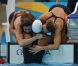 Camille Muffat, Charlotte Bonnet, Ophelie-Cyrielle Etienne et Coralie Balmy heureuses après avoir décroché le bronze olympique lors du relais 4x200 m nage libre lors des Jeux olympiques de Londres le 1er août 2012