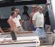 Elton John et David Furnish sur un yacht au large de St-Tropez, le lundi 13 août 2012.