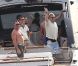 Elton John et David Furnish sur un yacht au large de St-Tropez, le lundi 13 août 2012.