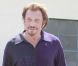 Johnny Hallyday après son passage chez le coiffeur dans le quartier de Beverly Hills, à Los Angeles, le 10 septembre 2012.