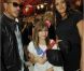 Karole Rocher, en compagnie de l'une de ses filles, aux côtés de son fidèle ami JoeyStarr à Paris le 11 septembre 2012