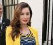 Kelly Brook arrive au défilé Zoe Jordan. Fashion Week de Londres, le 14 septembre 2012.