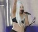 Lady Gaga en soutien-gorge, collant transparent et bottes Keko Hainswheeler à Los Angeles. Juillet 2011.