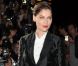 Laetitia Casta en costume Dolce &amp; Gabbana et sandales Giuseppe Zanotti au défilé Dolce &amp; Gabbana. Milan, le 23 Septembre 2012.