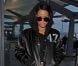 Rihanna à l'aéroport d'Heathrow porte des lunettes House of Holland, une veste Trapstar sous un sweat à capuche, un jogging Isaora et des sandales Manolo Blahnik. Londres, le 27 septembre 2012.