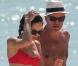 Exclusif - La sexy Olga Kurylenko et son compagnon Danny Huston forment un couple assorti en rouge sur la plage. Miami, le 16 octobre 2012.
