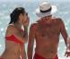 Exclusif - La sexy Olga Kurylenko et son compagnon Danny Huston forment un couple assorti en rouge sur la plage. Miami, le 16 octobre 2012.