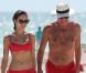 Exclusif - La sexy Olga Kurylenko et son compagnon Danny Huston forment un couple assorti en rouge sur la plage. Miami, le 16 octobre 2012.