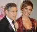 George Clooney et Stacy Keibler, charmant couple sur le tapis rouge de l'hôtel Beverly Hilton où a lieu le gala Carousel of Hope. Beverly Hills, le 20 octobre 2012.
