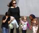 Angelina Jolie et trois de ses six enfants à la Nouvelle-Orléans le 11 mars 2012 : Zahara, Pax et Vivienne