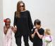 Angelina Jolie et trois de ses six enfants à la Nouvelle-Orléans le 11 mars 2012 : Zahara, Pax et Vivienne