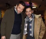 Julien Boisselier et Manu Payet assistent à la soirée de lancement de la collection Maison Martin Margiela pour H&amp;M dans la boutique H&amp;M des Champs-Élysées. Paris, le 14 novembre 2012.