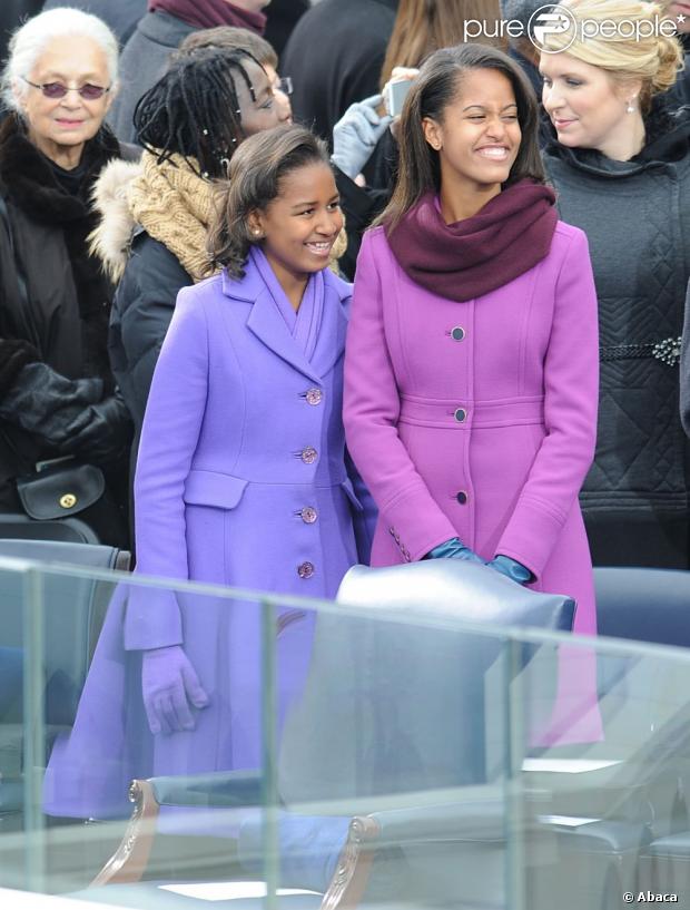 Sasha et Malia Obama portent des marques mainstream mais pointues à la cérémonie d'investiture de leur papa Barack Obama à Washington le 21 janvier 2013. Les soeurs ont choisi Kate Spade et J. Crew