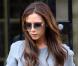 Exclusif - Victoria Beckham à Londres, avec un autre sac de sa marque éponyme et les mêmes bottes Christian Louboutin. Le 1er février 2013.