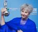 Yolande Moreau savoure son prix de la meilleure actrice dans un second rôle aux Magritte du Cinema à Bruxelles, le 2 février 2013.