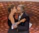 Laurent Ruquier et Virginie Guilhaume s'embrassent sur la bouche lors de la 28e cérémonie des Victoires de la Musique à Paris, le 8 février 2013.