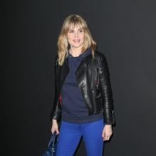 Emmanuelle Seigner assiste au défilé Etam Lingerie à la Bourse de Commerce. Paris, le 26 février 2013.