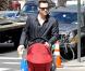 L'acteur américain Brian Austin Green emmène son bébé, Noah, en virée shopping dans un magasin Adidas, le 29 mars 2013 à New York.